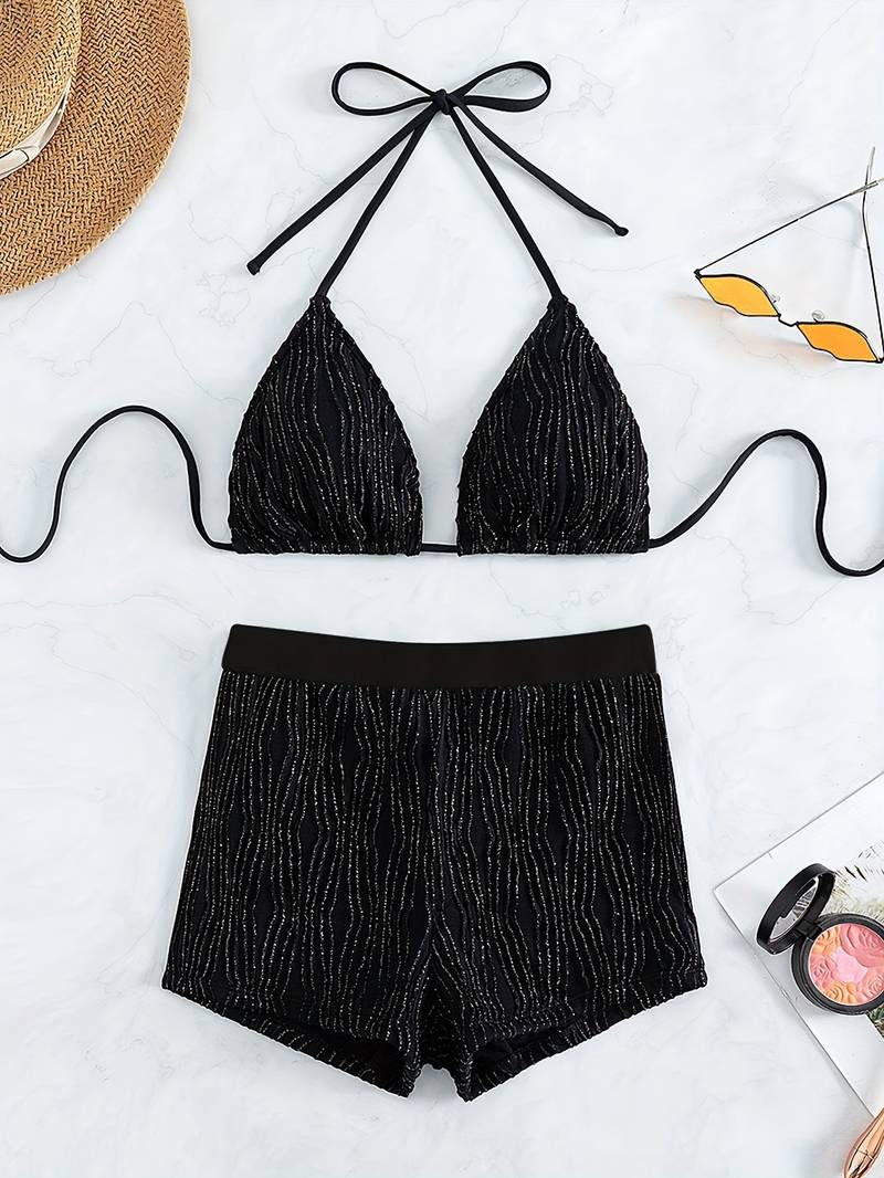 Revalki Alex Suit | Black glitter bikini with halter top and high-cut swimsuit bottom