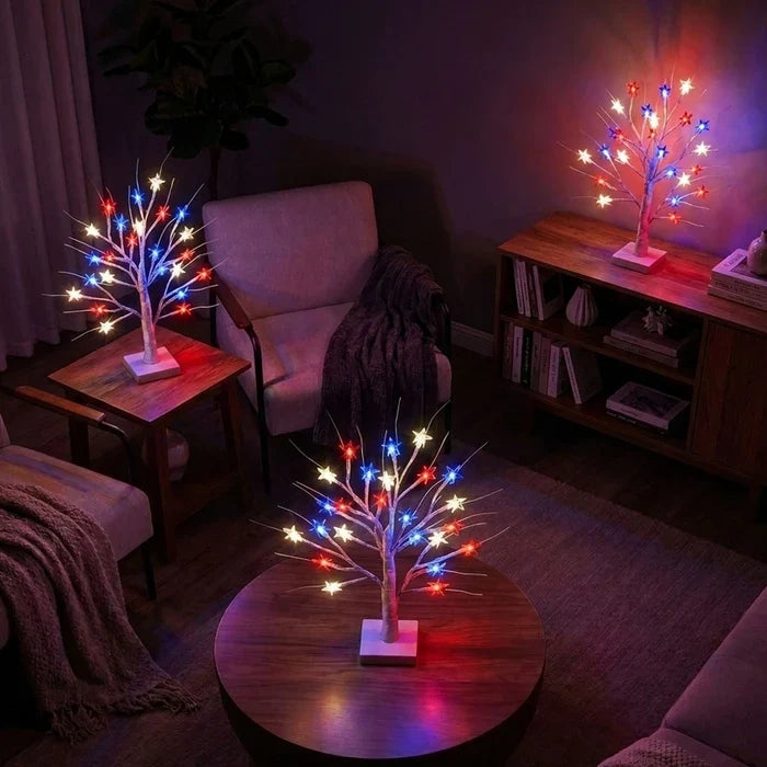 Decoratieve sterrenlamp – boompje met rode, witte en blauwe sterren op tafel