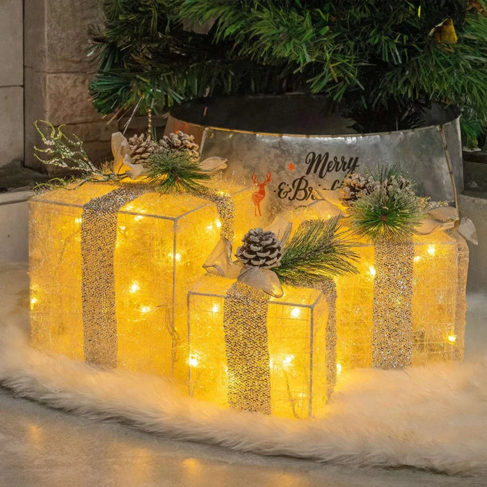 Lichtgevende kerstcadeaus – sierdozen met dennenappels voor onder de kerstboom