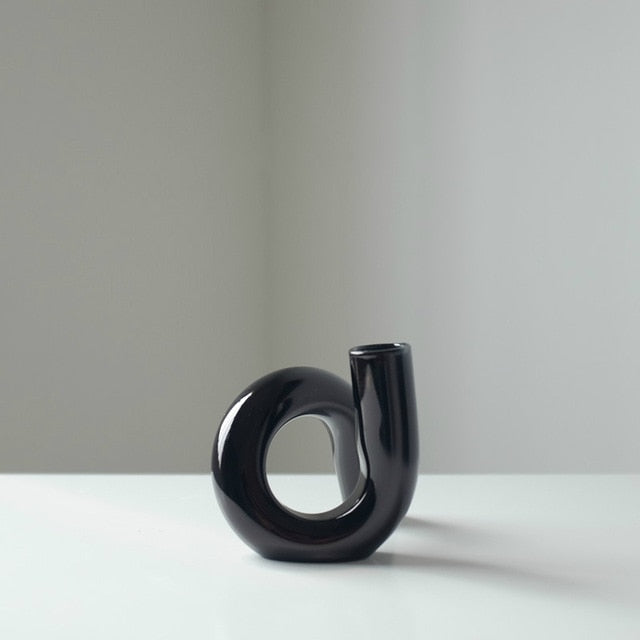 Loopora – Jarrón Hidropónico de Vidrio y Candelabro en Diseño de Bucle