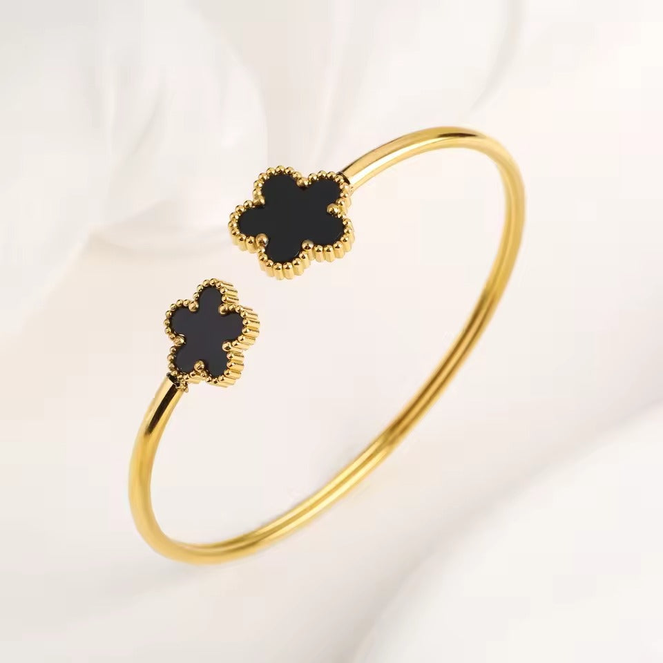 Nagel & Klaver Pulseiras | Aceiro inoxidable elegante en ouro e negro