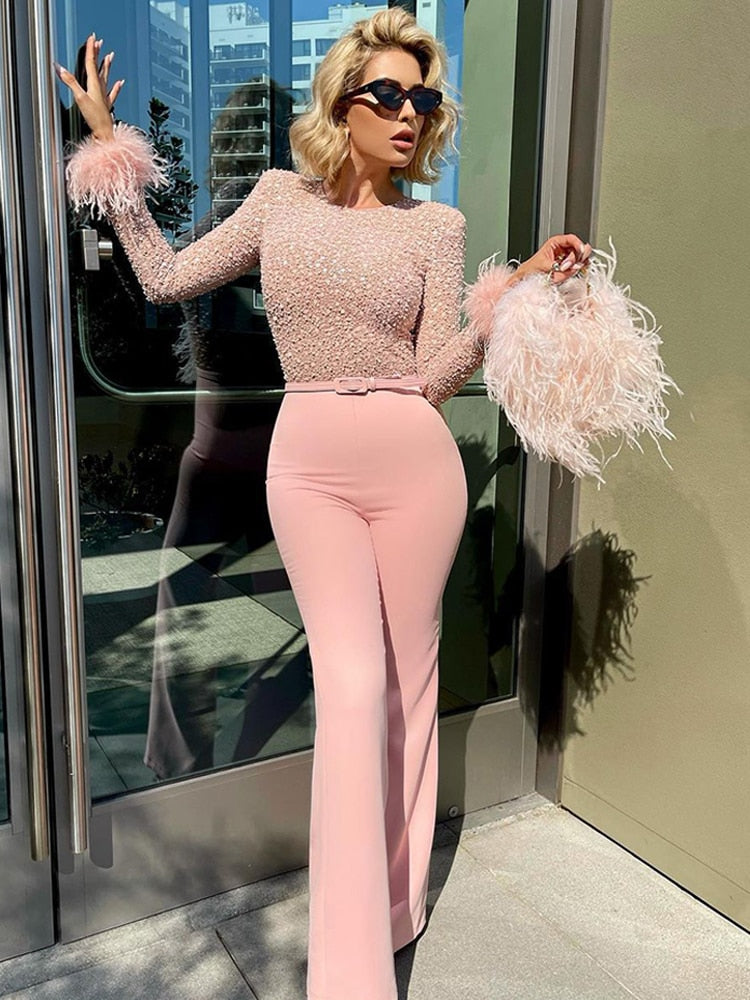 Revalki | Jumpsuit with Glitter and Feathers