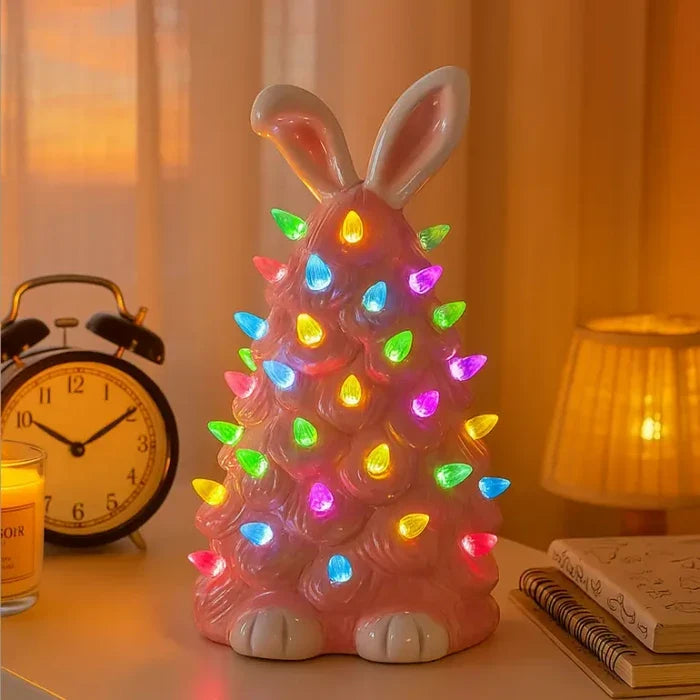 Lichtgevend konijn – roze decoratiefiguur met lampjes in regenboogkleuren