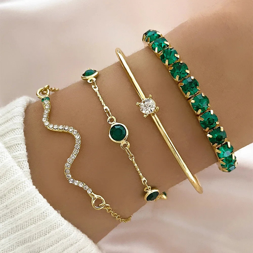 Serpenta Set van 4 slangenarmbanden met groene edelstenen en strasssteentjes