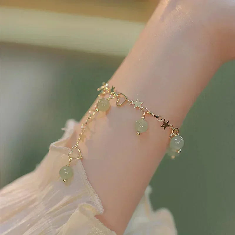 Serpenta Set van 4 slangenarmbanden met groene edelstenen en strasssteentjes