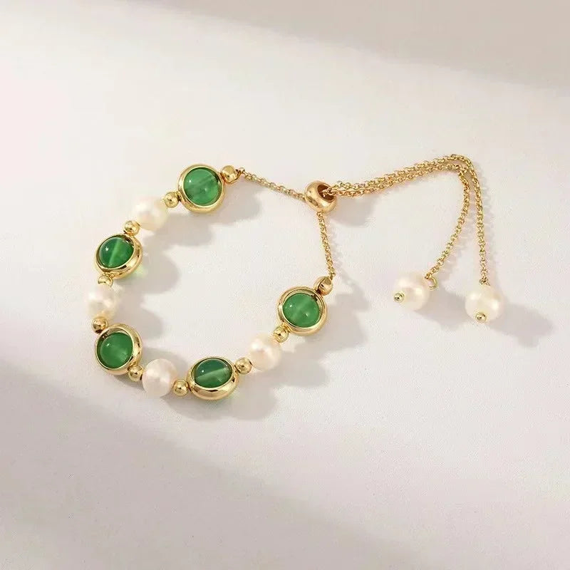 Serpenta Set van 4 slangenarmbanden met groene edelstenen en strasssteentjes