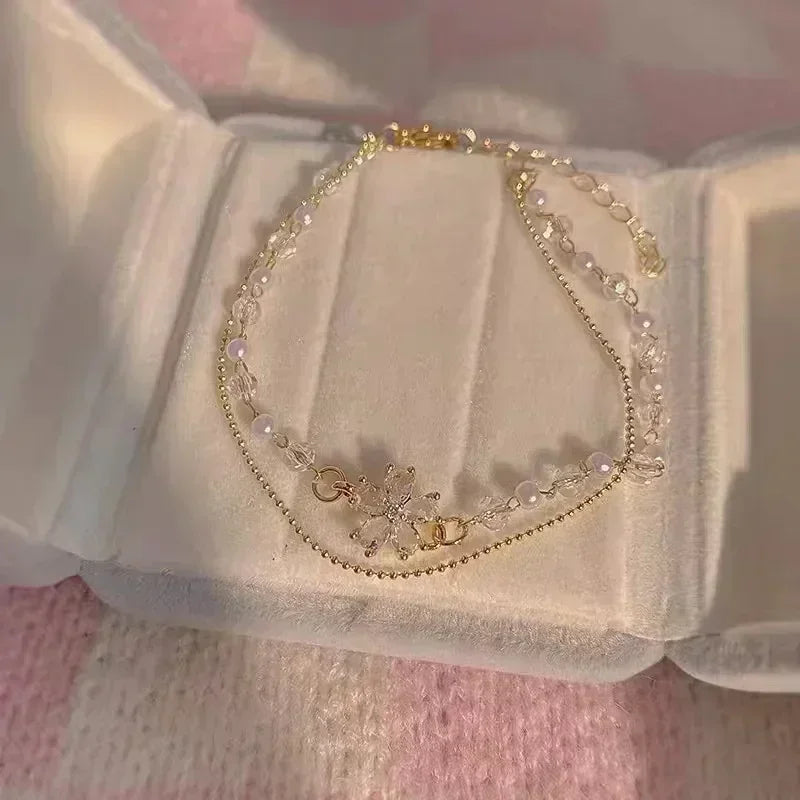 Serpenta Set van 4 slangenarmbanden met groene edelstenen en strasssteentjes