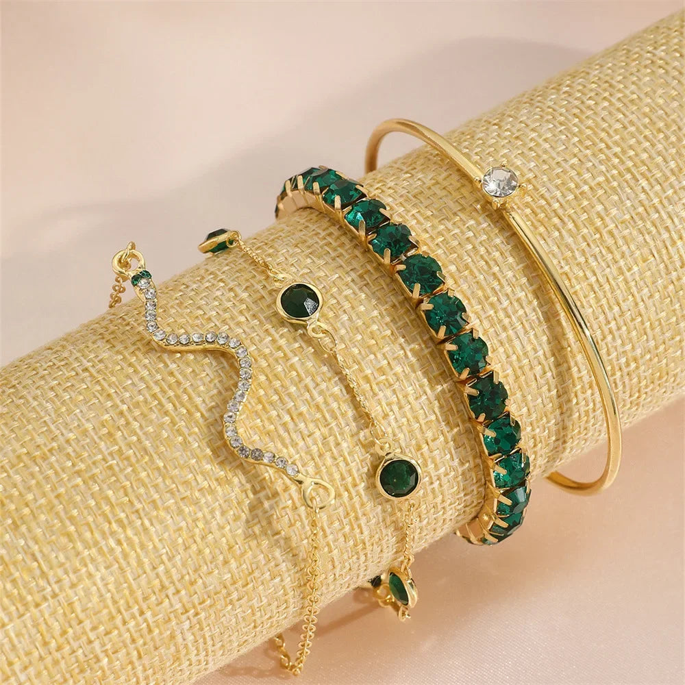 Serpenta Set van 4 slangenarmbanden met groene edelstenen en strasssteentjes