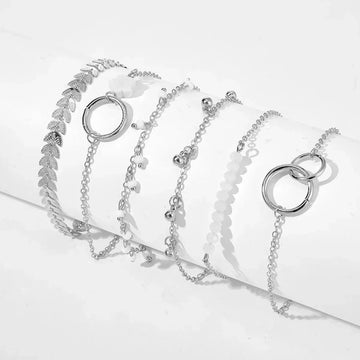 Serpenta Set van 4 slangenarmbanden met groene edelstenen en strasssteentjes