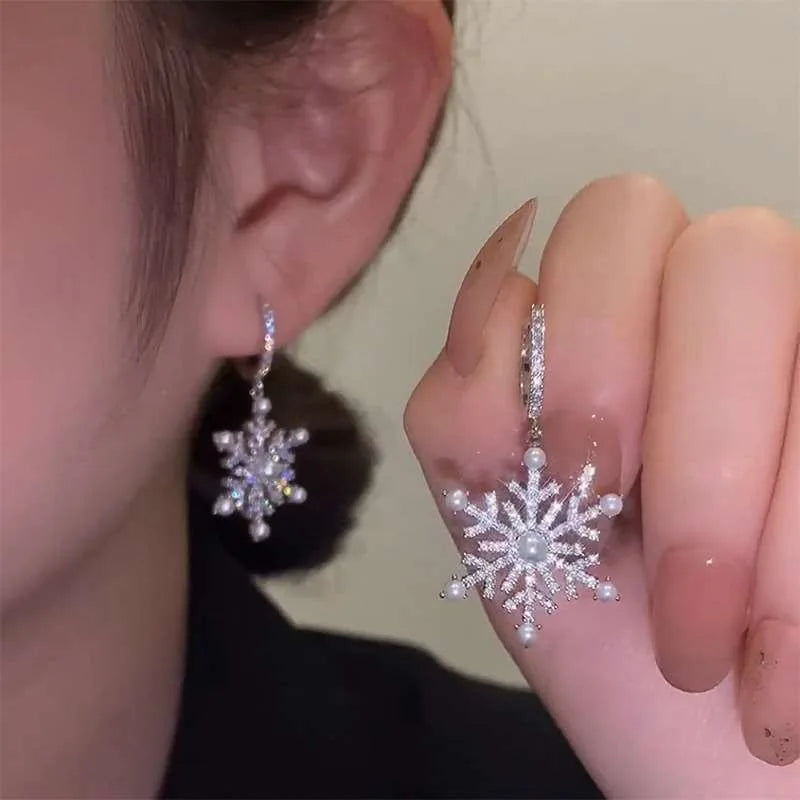 Arctelle Silver earrings for women with snowflake design and shiny cubic zirconia imitation