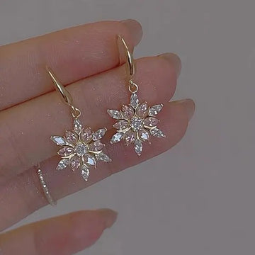 Arctelle Silver earrings for women with snowflake design and shiny cubic zirconia imitation