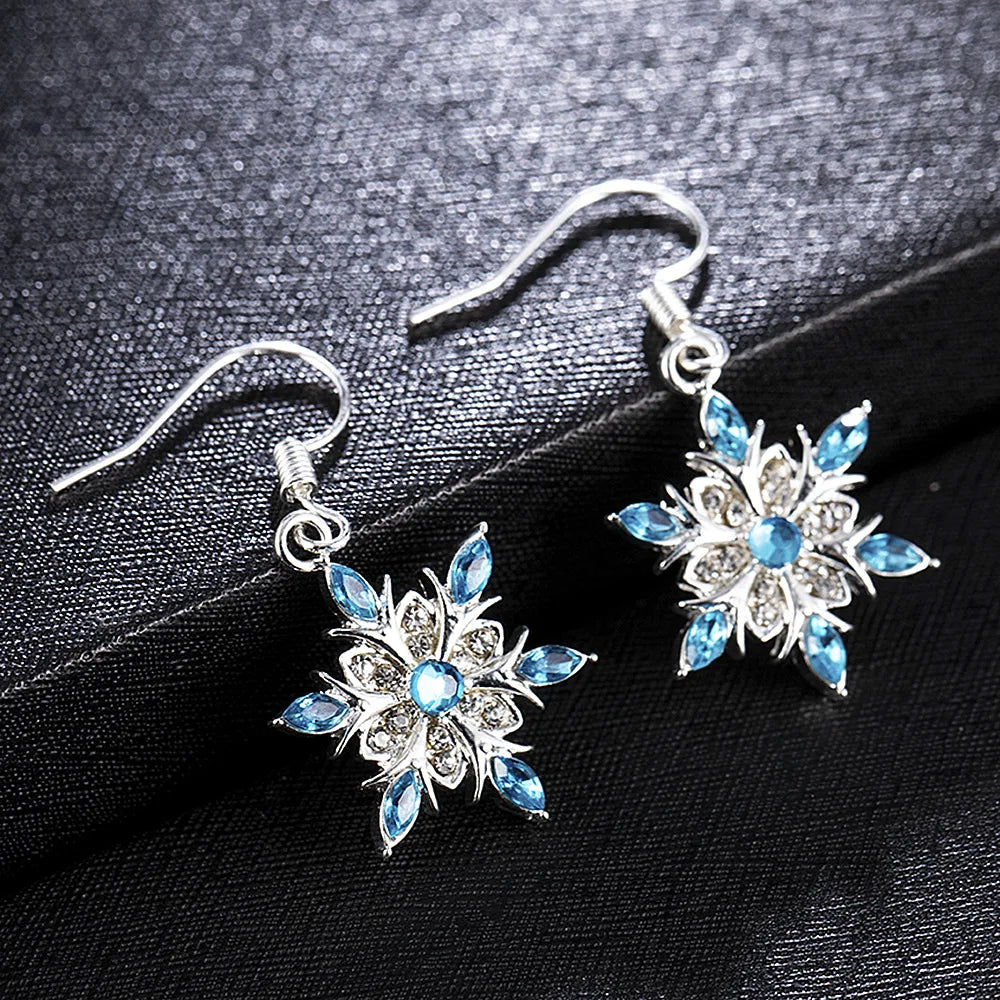 Arctelle Silver earrings for women with snowflake design and shiny cubic zirconia imitation