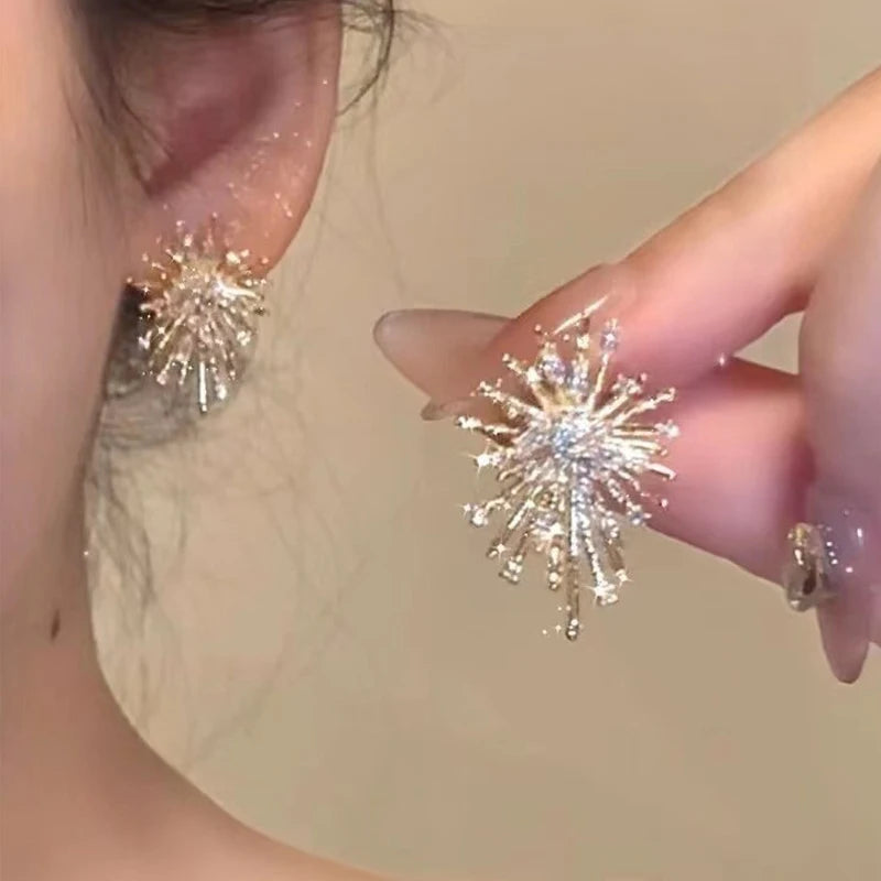 Arctelle Silver earrings for women with snowflake design and shiny cubic zirconia imitation