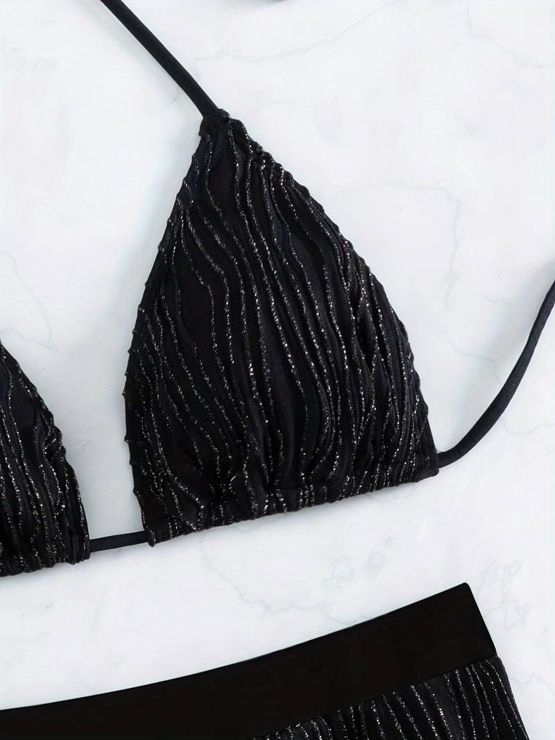 Revalki Alex Suit | Black glitter bikini with halter top and high-cut swimsuit bottom