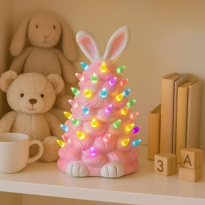 Lichtgevend konijn – roze decoratiefiguur met lampjes in regenboogkleuren
