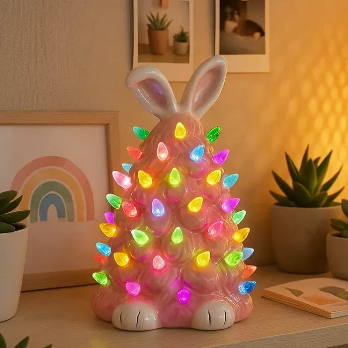 Lichtgevend konijn – roze decoratiefiguur met lampjes in regenboogkleuren